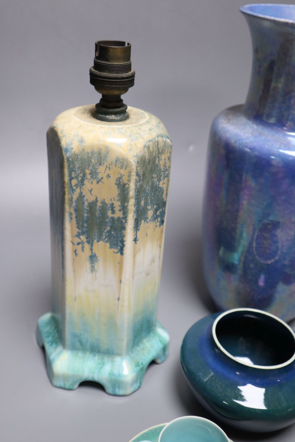 A collection of Ruskin pottery, including a blue lustre vase,